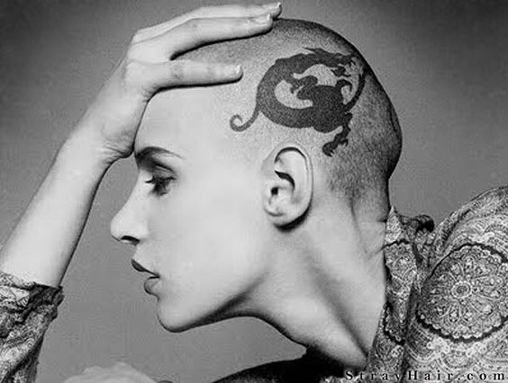 to have gotten matching head tattoos with DH?