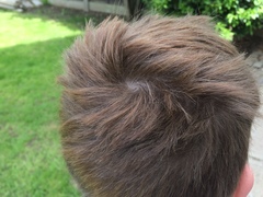 Any hairdressers/ barbers around? Please help me sort my ds's wayward hair!