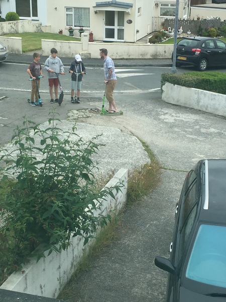 Adults on scooters