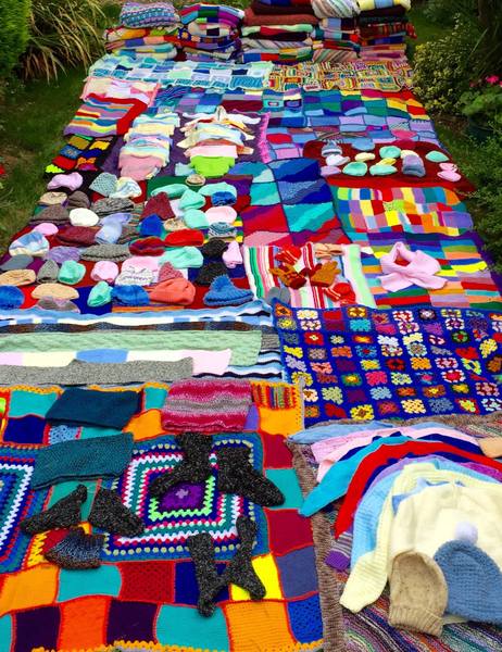 Woolly Hugs. Our Project to help refugees continues. One square, one blanket, a pair of gloves, one warm hat, one step at a time, really every little thing will help. All support welcome.