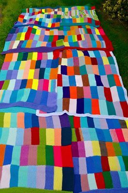 Woolly Hugs. Our Project to help refugees continues. One square, one blanket, a pair of gloves, one warm hat, one step at a time, really every little thing will help. All support welcome.