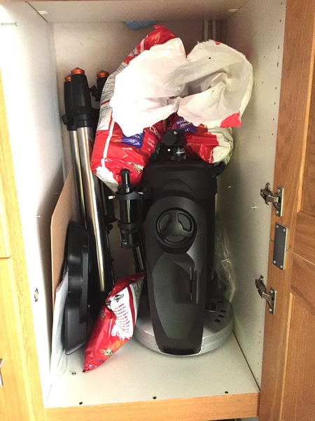 To want to shove a box of Doritos(or other salty snacks)in my husbands big telescope cupboard?