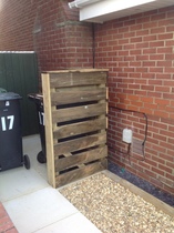 Neighbours new bin port - crossing our boundary ? Can anyone help with advice please ?