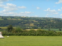 Campsite with pre-erected tents/yurt etc next to normal pitch..?
