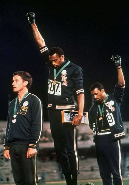 To think female athletes don't need to be kissed by those presenting them with their medals?