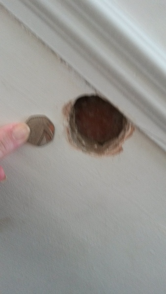 How do I fix these deep holes left by stairgates