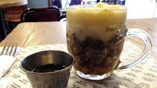 Why do restaurants serve food on manky looking wooden boards.