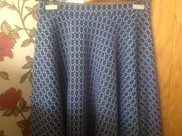 Please suggest an outfit for this skirt.