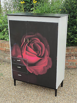 How weird would it be to put Pictures on the front of cupboard doors.