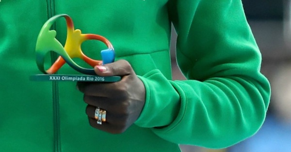 To think female athletes don't need to be kissed by those presenting them with their medals?