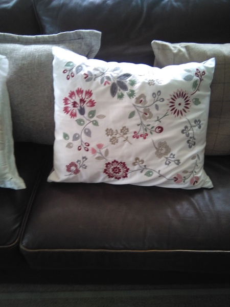 What colours go with a horrible salmon peach sofa?!