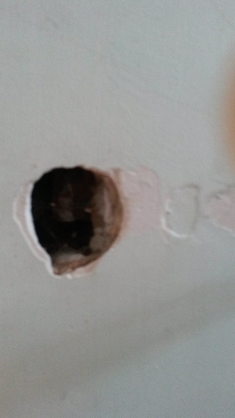 How do I fix these deep holes left by stairgates
