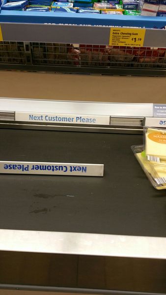 Woman in supermarket queue behind me