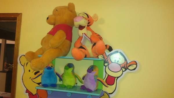 Ermaghad dh has just put pooh on a shelf