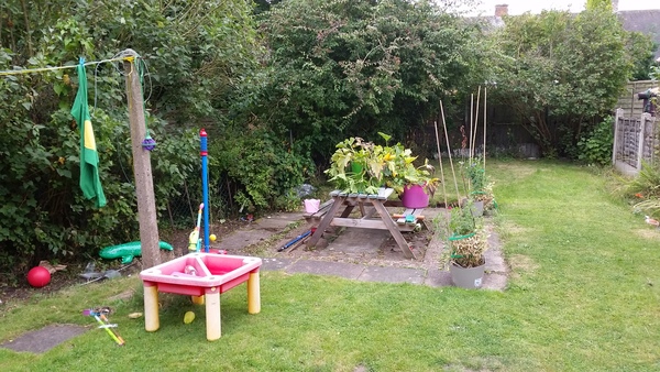 What can i do with this random concreted bit in the middle of my garden?
