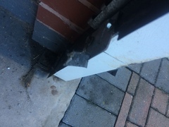 AIBU Courier broke our garage door!
