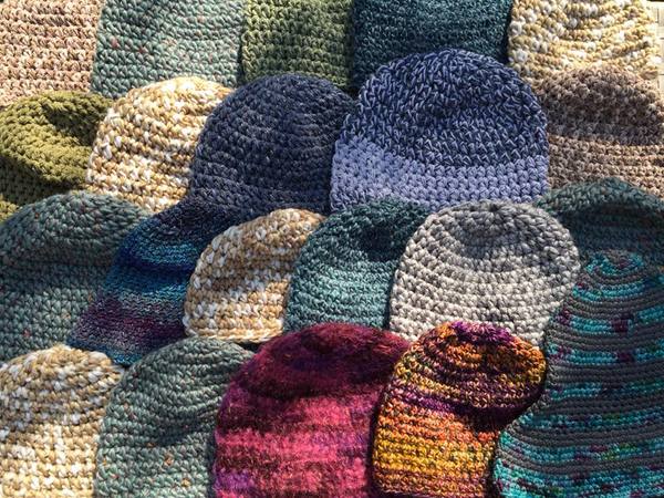 Woolly Hugs. Our Project to help refugees continues. One square, one blanket, a pair of gloves, one warm hat, one step at a time, really every little thing will help. All support welcome.