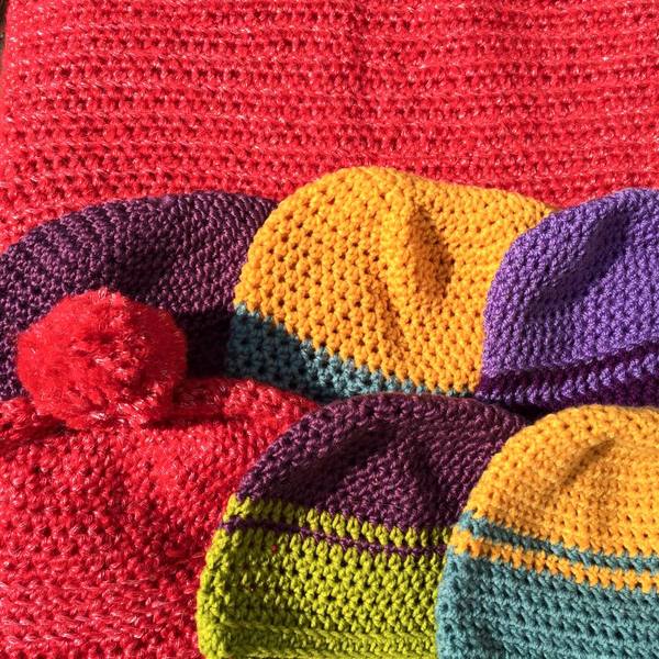 Woolly Hugs. Our Project to help refugees continues. One square, one blanket, a pair of gloves, one warm hat, one step at a time, really every little thing will help. All support welcome.