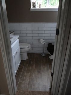 What floor tiles with metro tiles in small bathroom?