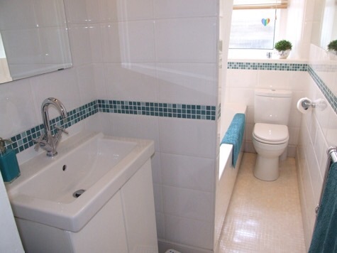 Awkward bathroom - can you have taps in the middle AND an over bath shower?