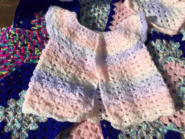 Woolly Hugs. Our Project to help refugees continues. One square, one blanket, a pair of gloves, one warm hat, one step at a time, really every little thing will help. All support welcome.