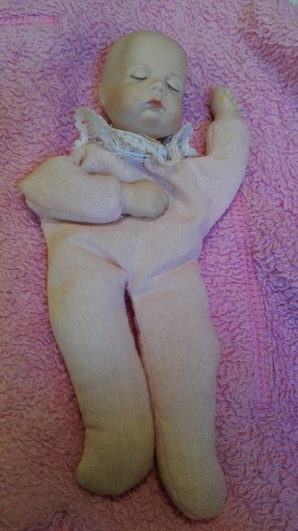 To have said out loud that the doll was hideous