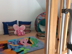 mezzanine space above bedroom