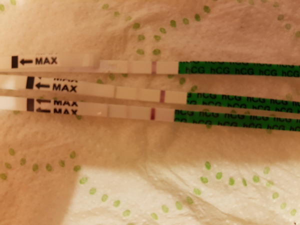 Am worried. Very faint line, 2 days late.