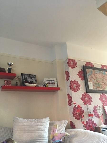 What colour walls with cream sofa and red assessories