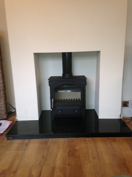 Should we keep this surround for our wood burner?
