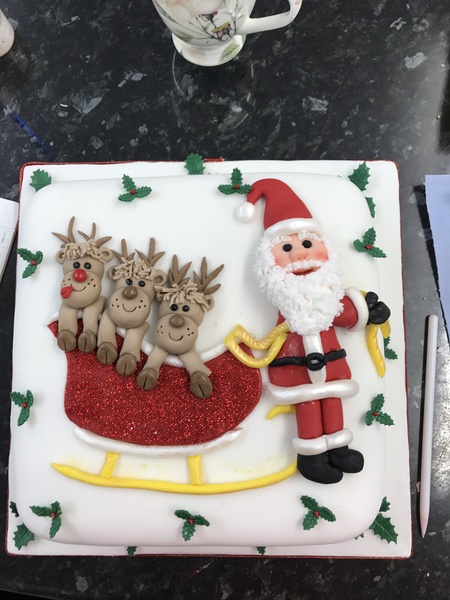 AIBU to serve up a cake that has contact glitter on it instead of edible?
