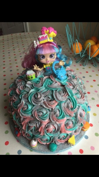AIBU to serve up a cake that has contact glitter on it instead of edible?