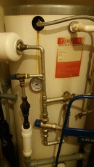 How do you adjust a water heater timer?