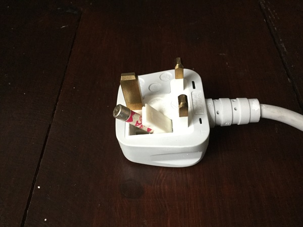 Can't get at the fuse in a sealed plug - help!
