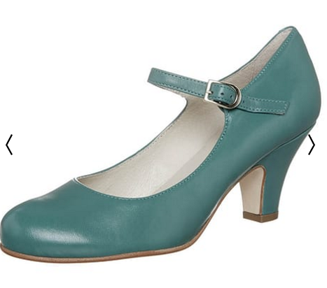 What can I wear with a plain navy dress to avoid looking like a matronly nun?
