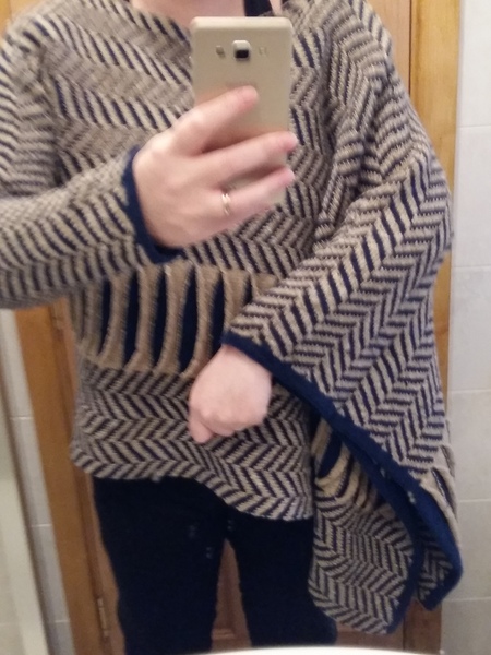 DH got me: a poncho with one arm!