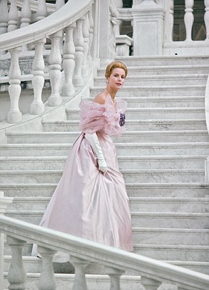 What do I wear with this evening dress to cover my arms and make it more fitting for a 55 year old?