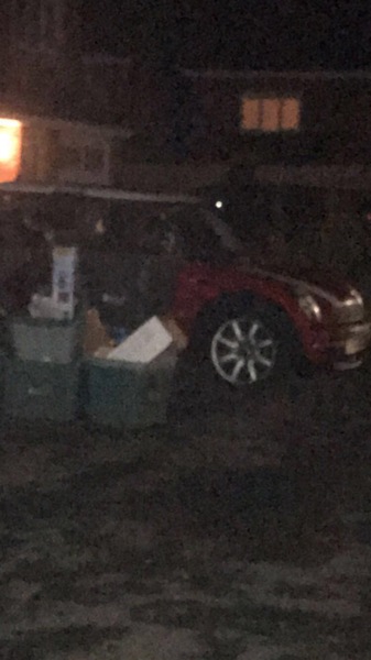 Blocking neighbour's car with bins