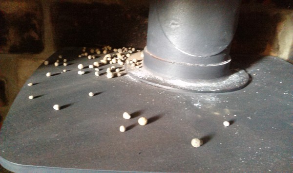Woodburner novice - any idea what these "pellets" coming down chinney might be?