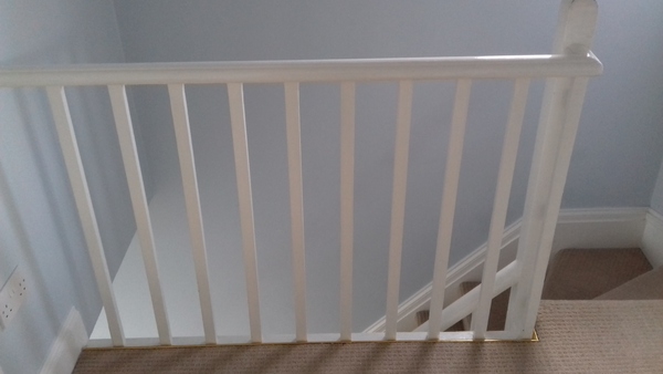 Can anyone recommend a stair guard to stop a crawling baby falling between balusters?