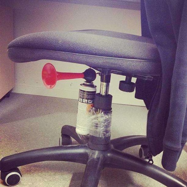 Colleague leaves chair in the aisle - WIBU to hide it?