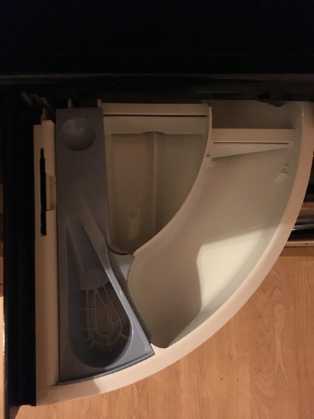 Which compartment do I put the washing powder in?