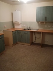 How to make kitchen cupboards less hideous?