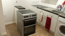 Anyone with professional knowledge about electrical switches and sockets in open living area kitchen?