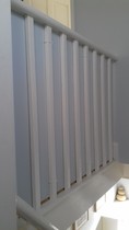 Can anyone recommend a stair guard to stop a crawling baby falling between balusters?
