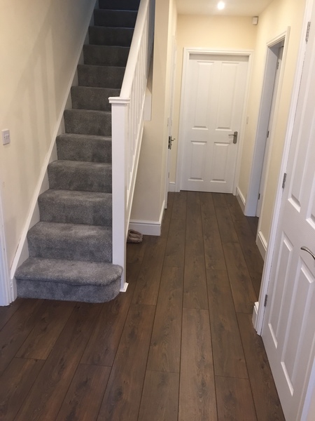 Has any recently installed laminate flooring in their house?