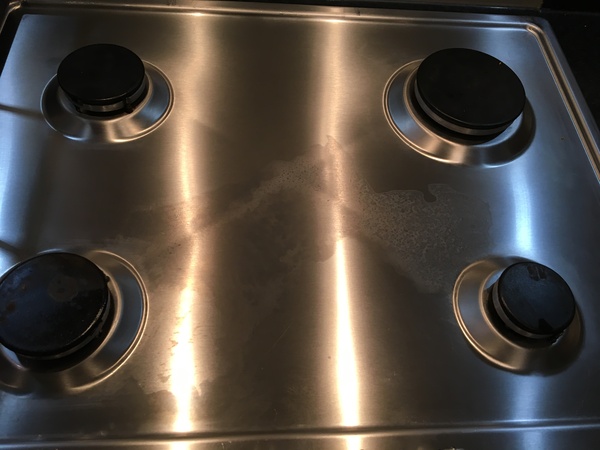 Is my stainless steel hob ruined? (See pics!)