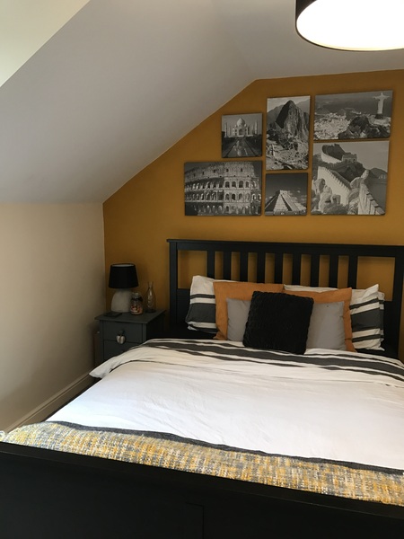 Mustard coloured bedroom walls ...