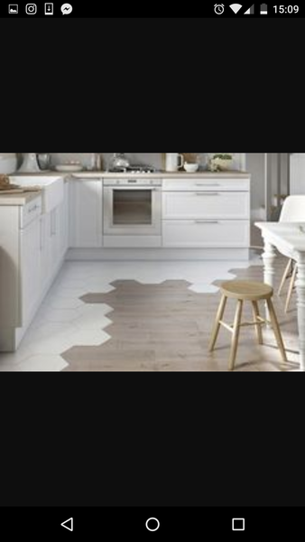 Does anyone have original floorboards and engineered wood in adjacent rooms?