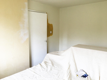 Mustard coloured bedroom walls ...